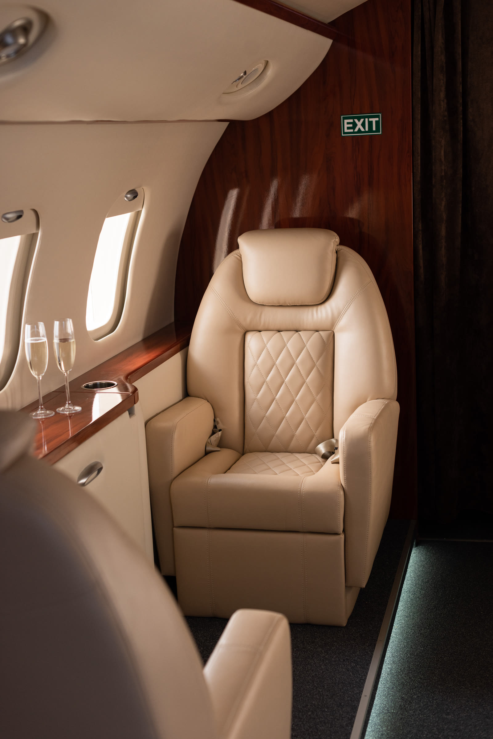 Private jet cabin with champagne